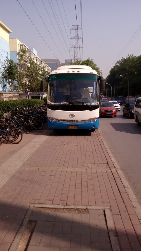Walking to work the other day, I came across a bus, parked on the sidewalk. It's Beijing. You just accept these things as normal.