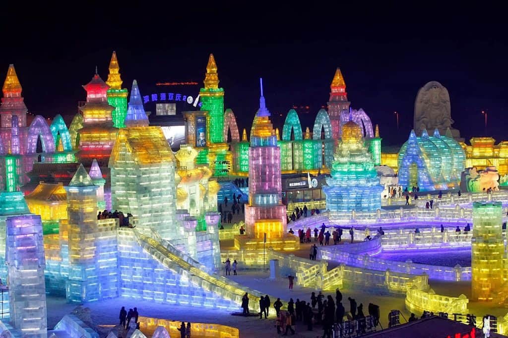Next stop: Harbin, January 28 to attend the Harbin Ice Festival shown here. Those aren't material structures; they're made of ice. How cool is that?